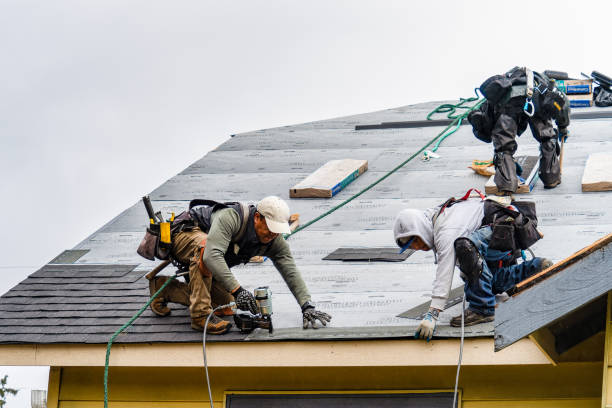 Professional Gutter Installation technician working in Russell, IA